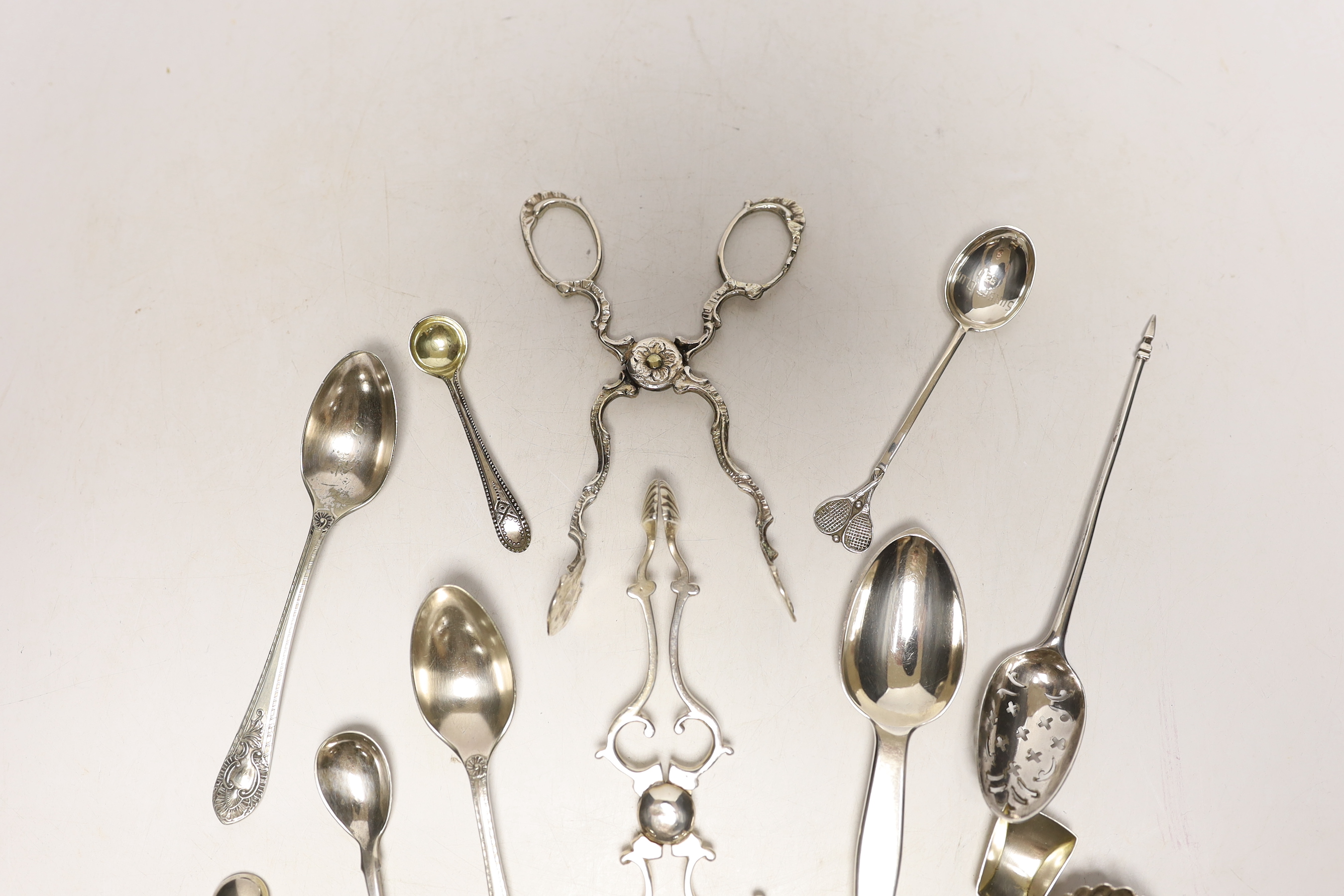 A small quantity of assorted silver flatware etc. including spoons, caddy spoon, condiment spoons, 18th century mote spoon and two pairs of sugar nips.